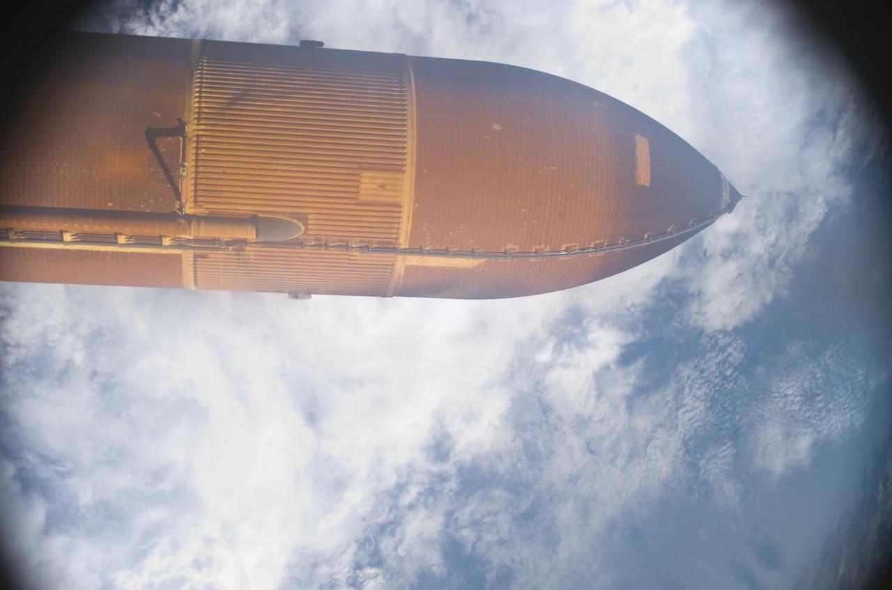 S134-E-005014 (16 May 2011) --- The STS-134 external fuel tank is seen during its release from space shuttle Endeavour in space following the successful launch on May 16, 2011. A camera in the umbilical well exposed the image. Photo credit: NASA