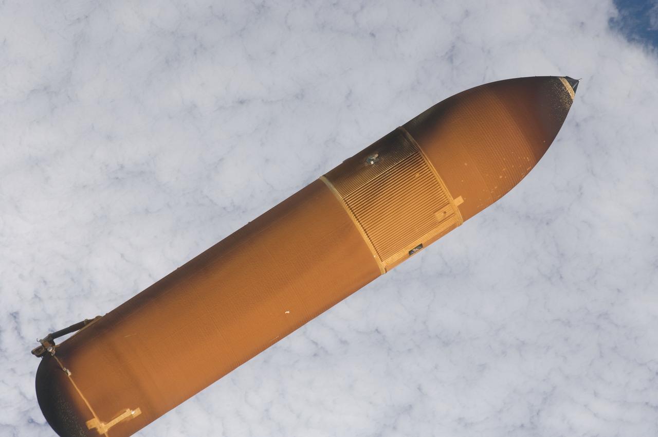 S134-E-005085  (16 May 2011) --- The STS-134 external fuel tank is seen during its release from space shuttle Endeavour in space following the successful launch on May 16, 2011. An STS-134 crew member using a hand-held still camera  exposed the image. Photo credit: NASA