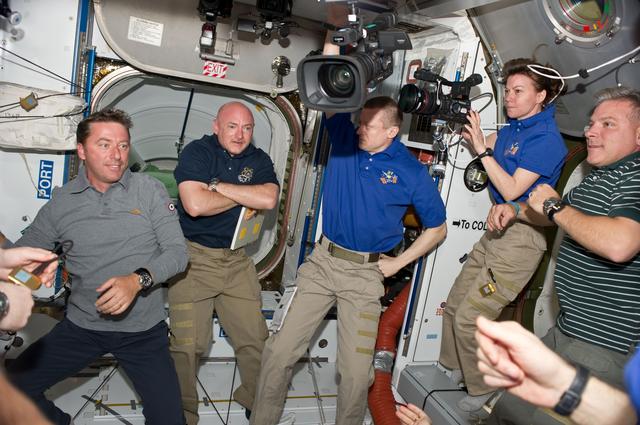 NASA image: STS-134 and Expedition 27 Crew Members greet one another after Docking