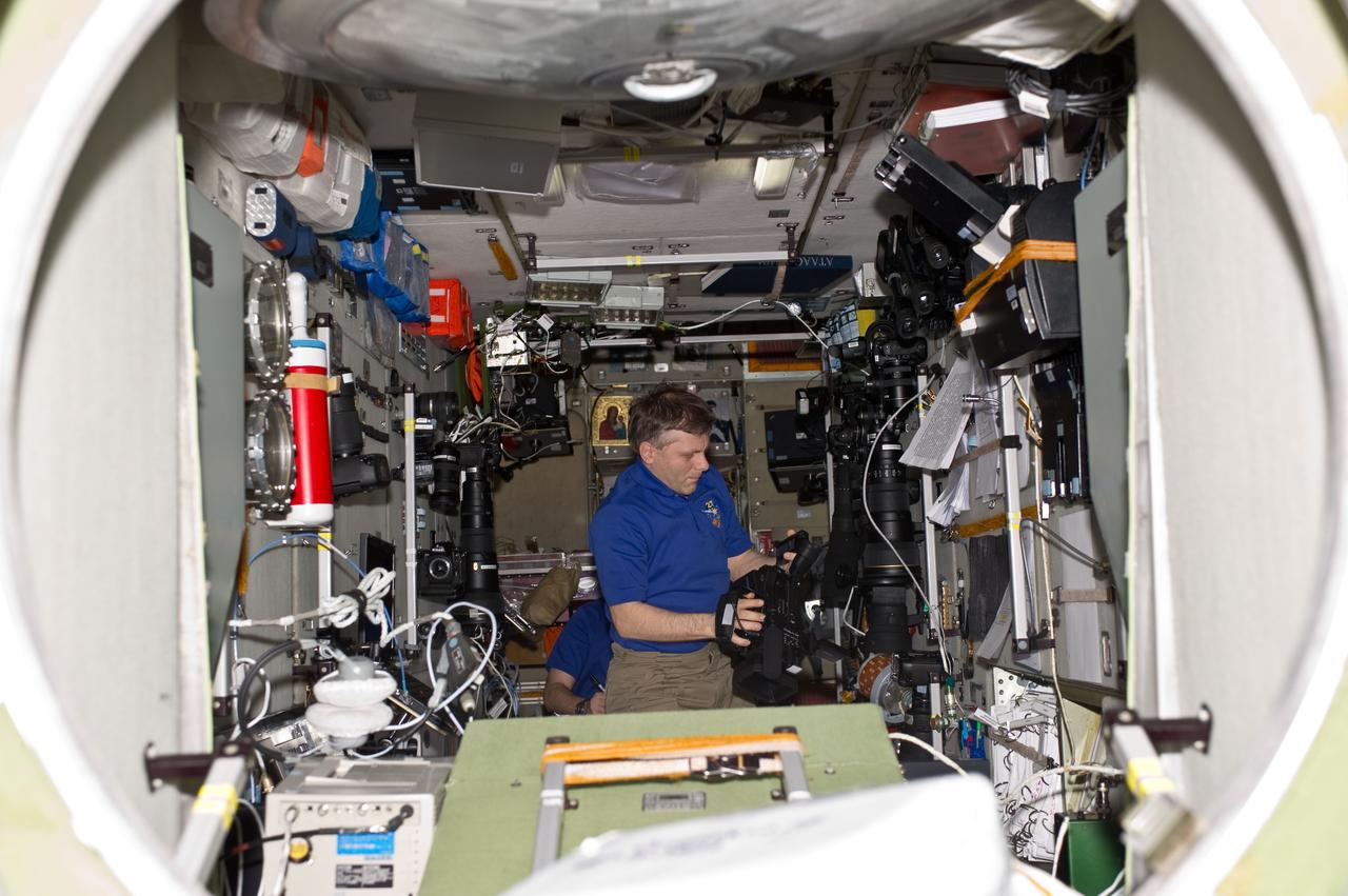 Expedition 27 FE Borisenko works with a Camera in the SM