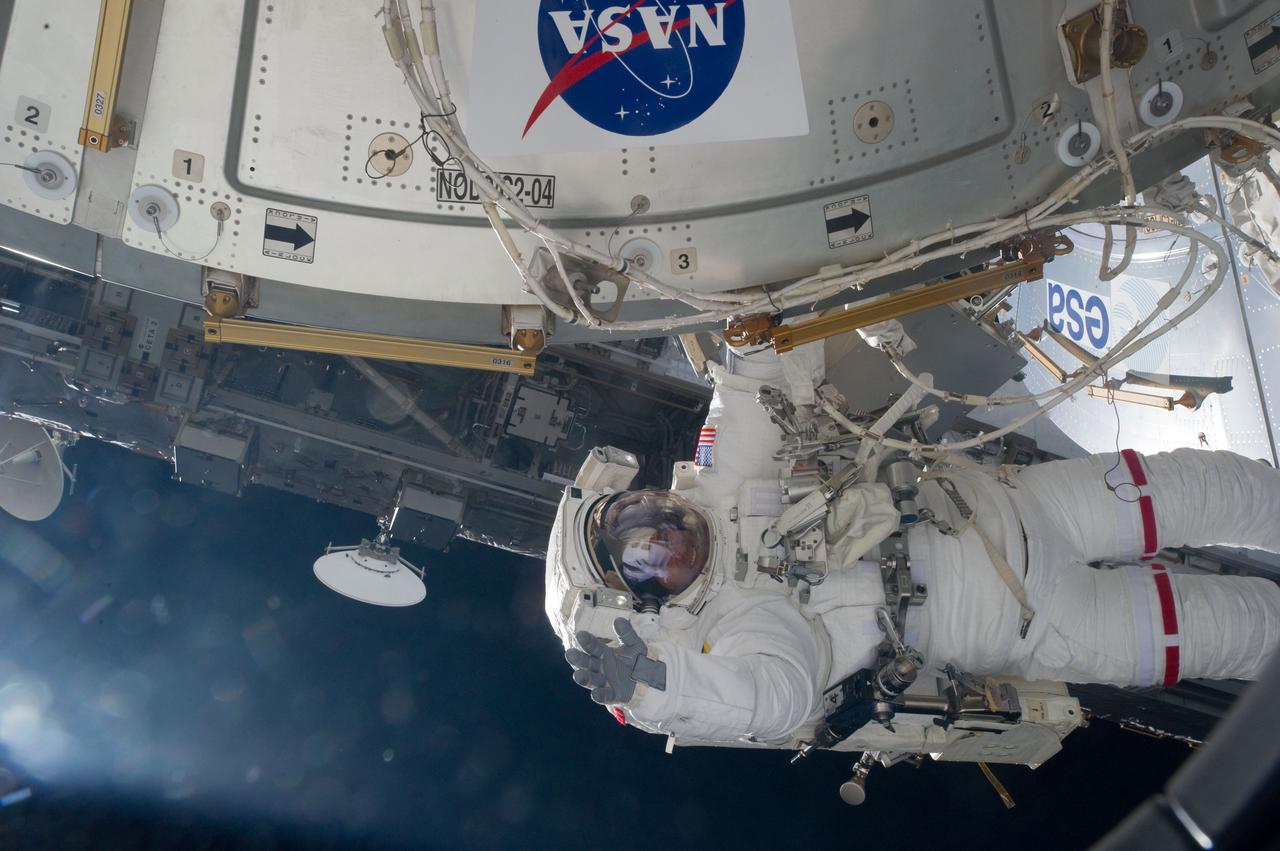 S134-E-007551 (20 May 2011) --- NASA astronaut Greg Chamitoff, STS-134 mission specialist, participates in the mission's first session of extravehicular activity (EVA) as construction and maintenance continue on the International Space Station. During the six-hour, 19-minute spacewalk, Chamitoff and astronaut Andrew Feustel (out of fame) retrieved long-duration materials exposure experiments and installed another, installed a light on one of the station?s rail line handcarts, made preparations for adding ammonia to a cooling loop and installed an antenna for the External Wireless Communication system. Photo credit: NASA