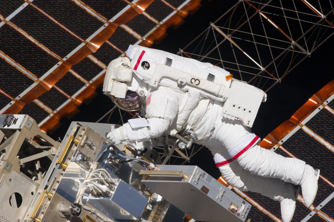S134-E-007571 (20 May 2011) --- NASA astronaut Andrew Feustel, STS-134 mission specialist, participates in the mission's first session of extravehicular activity (EVA) as construction and maintenance continue on the International Space Station. During the six-hour, 19-minute spacewalk, Feustel and astronaut Greg Chamitoff (out of fame) retrieved long-duration materials exposure experiments and installed another, installed a light on one of the station?s rail line handcarts, made preparations for adding ammonia to a cooling loop and installed an antenna for the External Wireless Communication system. Photo credit: NASA