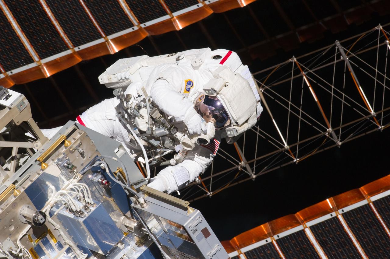 S134-E-007595 (20 May 2011) --- NASA astronaut Andrew Feustel, STS-134 mission specialist, participates in the mission's first session of extravehicular activity (EVA) as construction and maintenance continue on the International Space Station. During the six-hour, 19-minute spacewalk, Feustel and astronaut Greg Chamitoff (out of fame) retrieved long-duration materials exposure experiments and installed another, installed a light on one of the station?s rail line handcarts, made preparations for adding ammonia to a cooling loop and installed an antenna for the External Wireless Communication system. Photo credit: NASA