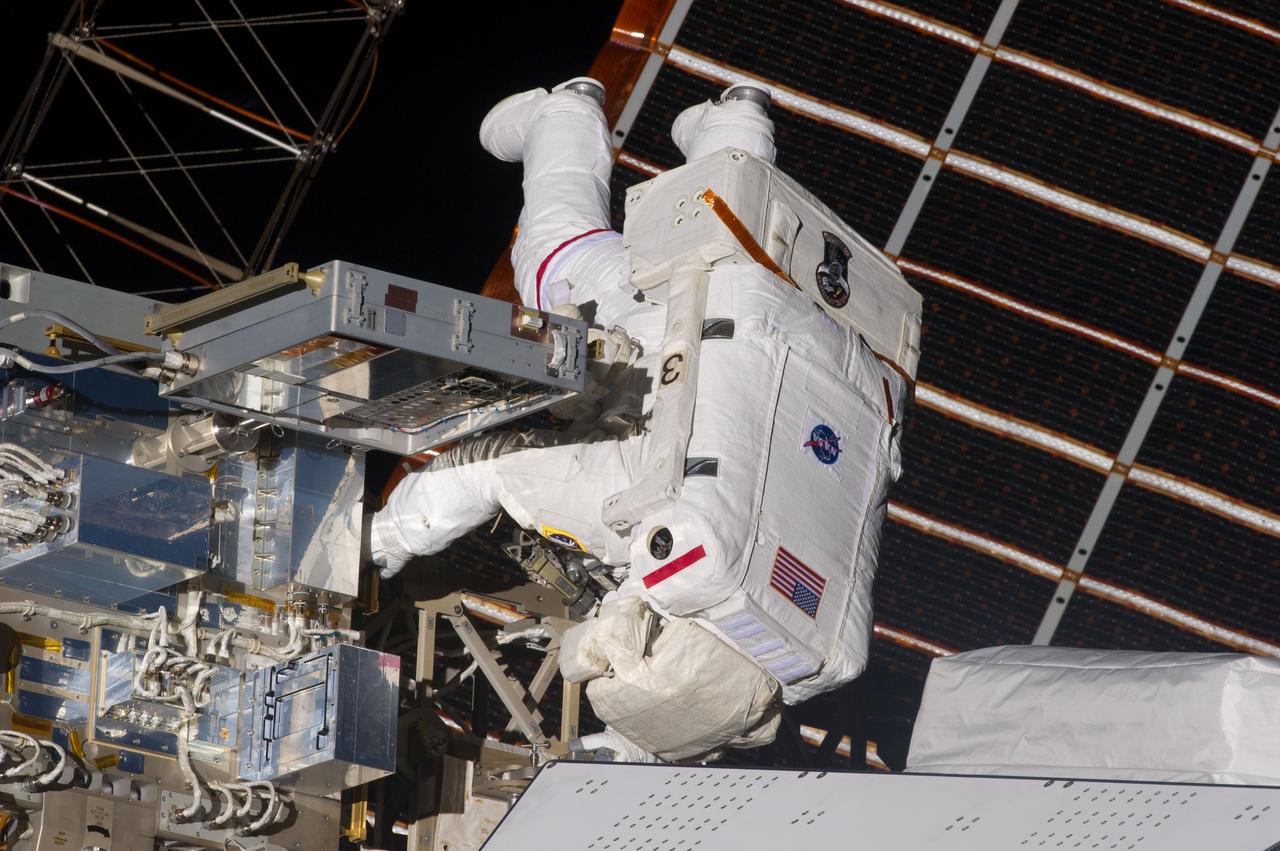 S134-E-007616 (20 May 2011) --- NASA astronaut Andrew Feustel, STS-134 mission specialist, participates in the mission's first session of extravehicular activity (EVA) as construction and maintenance continue on the International Space Station. During the six-hour, 19-minute spacewalk, Feustel and astronaut Greg Chamitoff (out of fame) retrieved long-duration materials exposure experiments and installed another, installed a light on one of the station?s rail line handcarts, made preparations for adding ammonia to a cooling loop and installed an antenna for the External Wireless Communication system. Photo credit: NASA