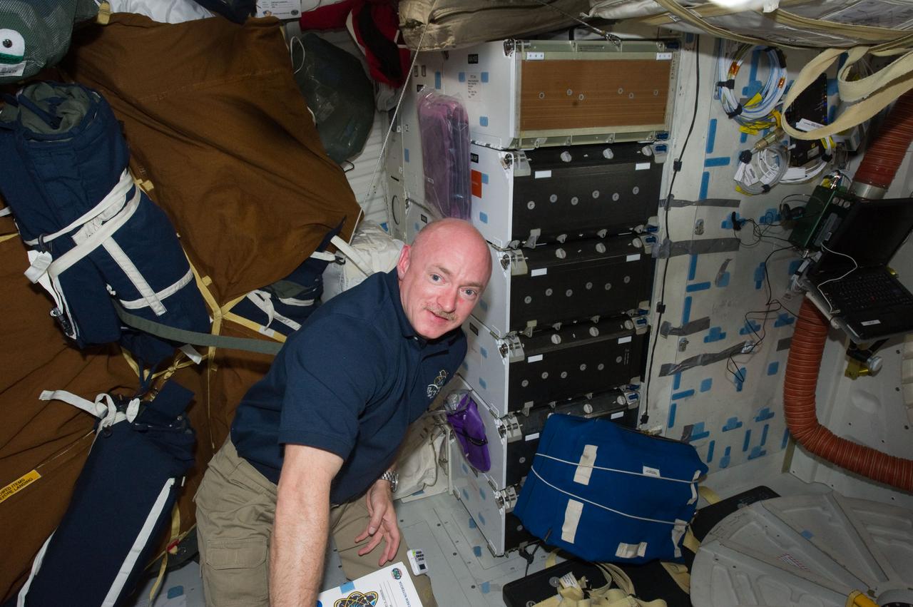 S134-E-007766 (20 May 2011) --- NASA astronaut Mark Kelly, STS-134 commander, is pictured on the middeck of space shuttle Endeavour while docked with the International Space Station. Photo credit: NASA