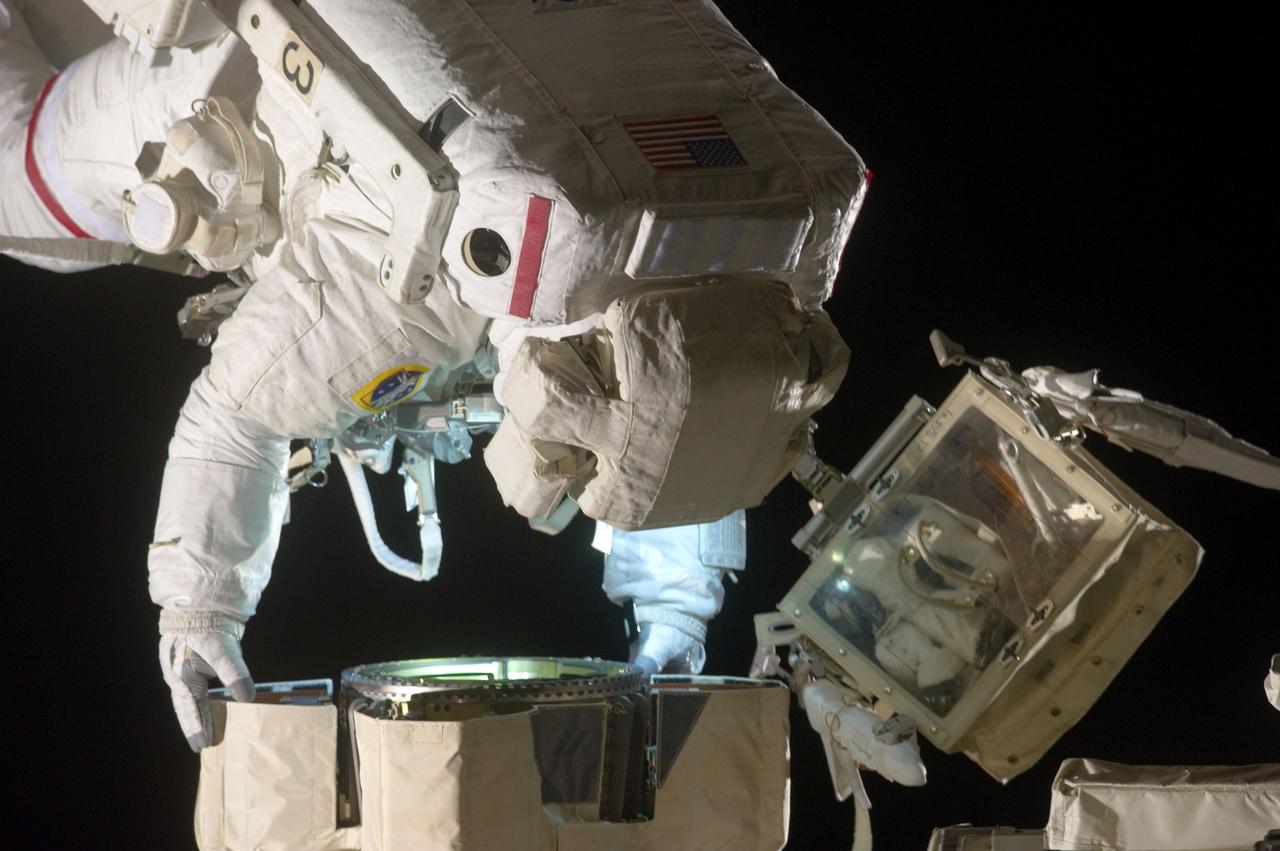S134-E-008635 (22 May 2011) --- NASA astronaut Andrew Feustel, STS-134 mission specialist, participates in the mission's second session of extravehicular activity (EVA) as construction and maintenance continue on the International Space Station. During the eight-hour, seven-minute spacewalk, Feustel and astronaut Michael Fincke (out of frame), mission specialist, completed all planned tasks, including refilling one of the station’s cooling loops with ammonia and lubricating one of the station’s massive solar alpha rotary joints. Photo credit: NASA