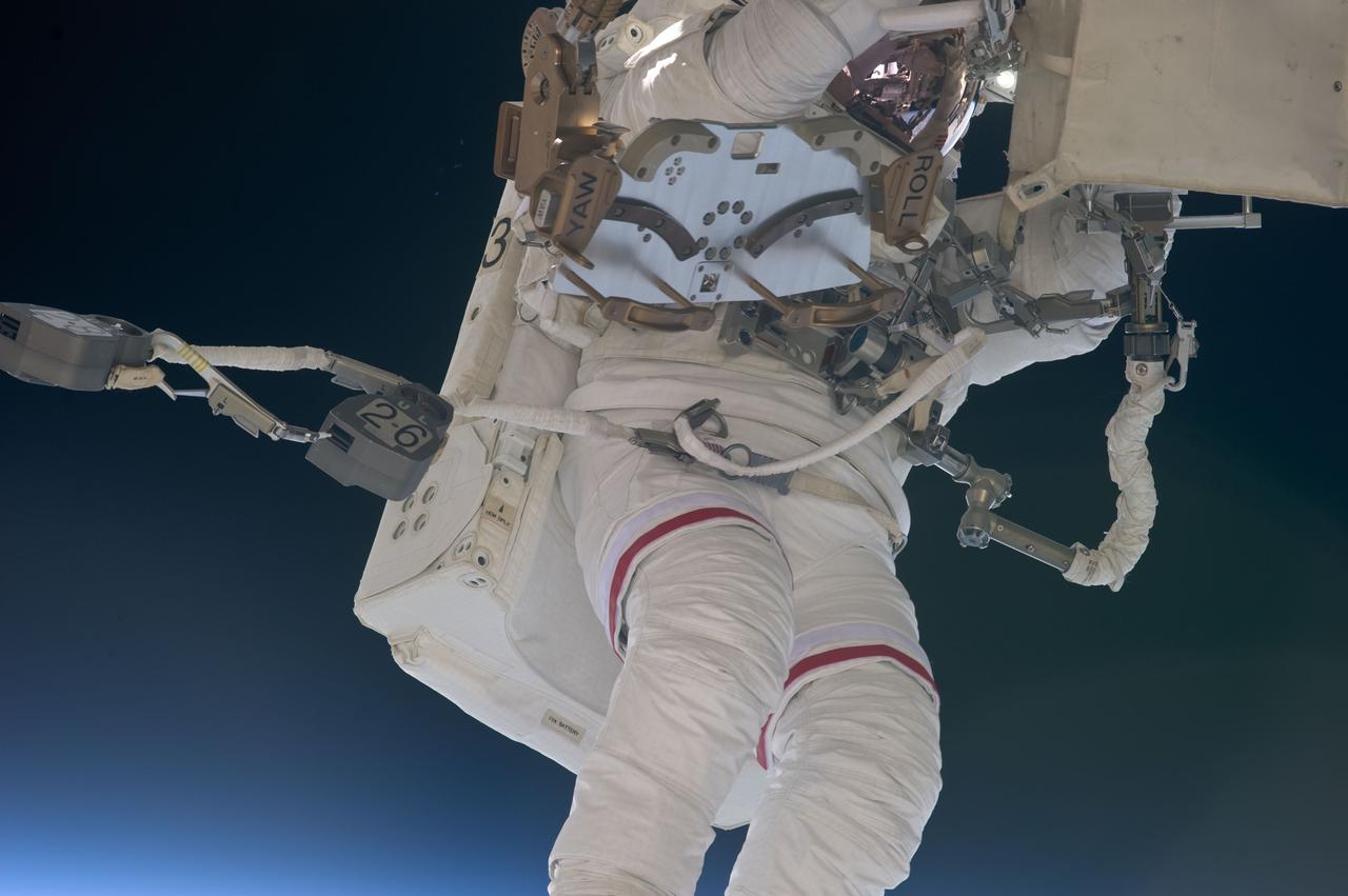 S134-E-008658 (22 May 2011) --- NASA astronaut Andrew Feustel, STS-134 mission specialist, participates in the mission's second session of extravehicular activity (EVA) as construction and maintenance continue on the International Space Station. During the eight-hour, seven-minute spacewalk, Feustel and astronaut Michael Fincke (out of frame), mission specialist, completed all planned tasks, including refilling one of the station’s cooling loops with ammonia and lubricating one of the station’s massive solar alpha rotary joints. Photo credit: NASA