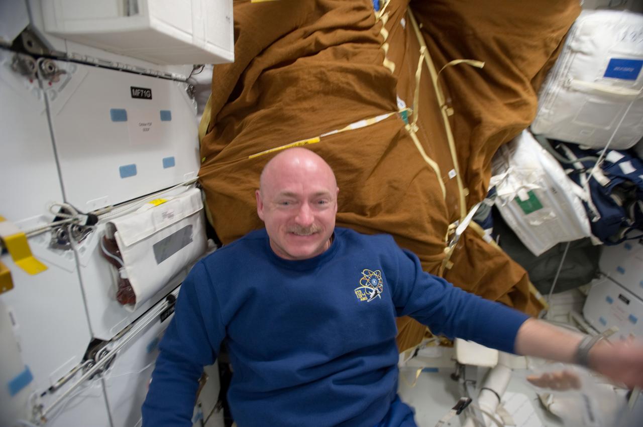 S134-E-008751 (23 May 2011) --- NASA astronaut Mark Kelly, STS-134 commander, is pictured on the middeck of space shuttle Endeavour while docked with the International Space Station. Photo credit: NASA