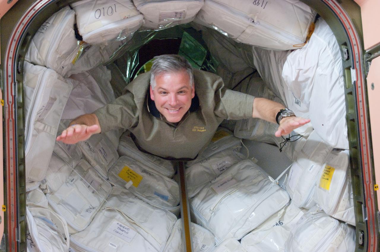 View of STS-134 Pilot Johnson in the PMA-1