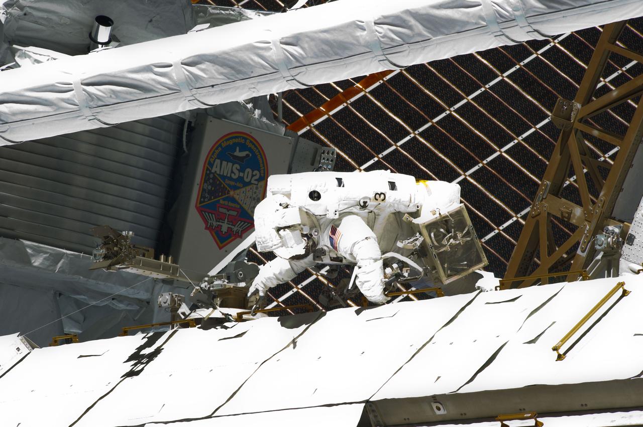 S134-E-009592 (27 May 2011) --- NASA astronaut Michael Fincke participates in the mission's fourth session of extravehicular activity (EVA) as construction and maintenance continue on the International Space Station. During the seven-hour, 24-minute spacewalk, Fincke and astronaut Greg Chamitoff (out of frame), both STS-134 mission specialists, completed the primary objectives for the spacewalk, including stowing the 50-foot-long boom and adding a power and data grapple fixture to make it the Enhanced International Space Station Boom Assembly, available to extend the reach of the space station's robotic arm. Photo credit: NASA