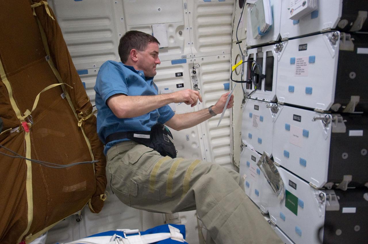 S135-E-006277 (9 July 2011) --- NASA astronaut Rex Walheim, STS-135 mission specialist, is pictured on the middeck of the space shuttle Atlantis during the mission's second day of activities in Earth orbit. Photo credit: NASA