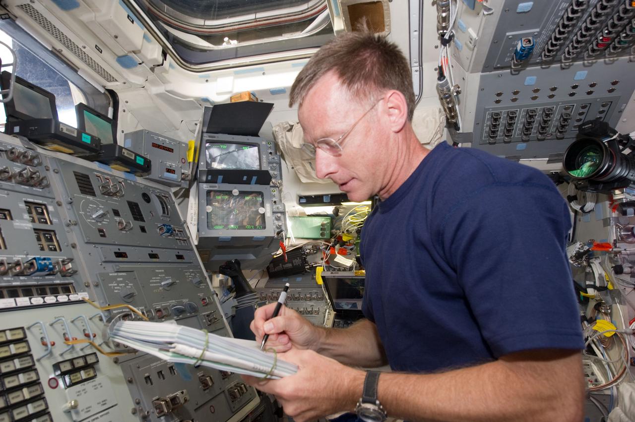 S135-E-006395 (9 July 2011) --- NASA astronaut Chris Ferguson, STS-135 commander, is pictured on the aft flight deck of the space shuttle Atlantis during the mission's second day of activities in Earth orbit. Photo credit: NASA