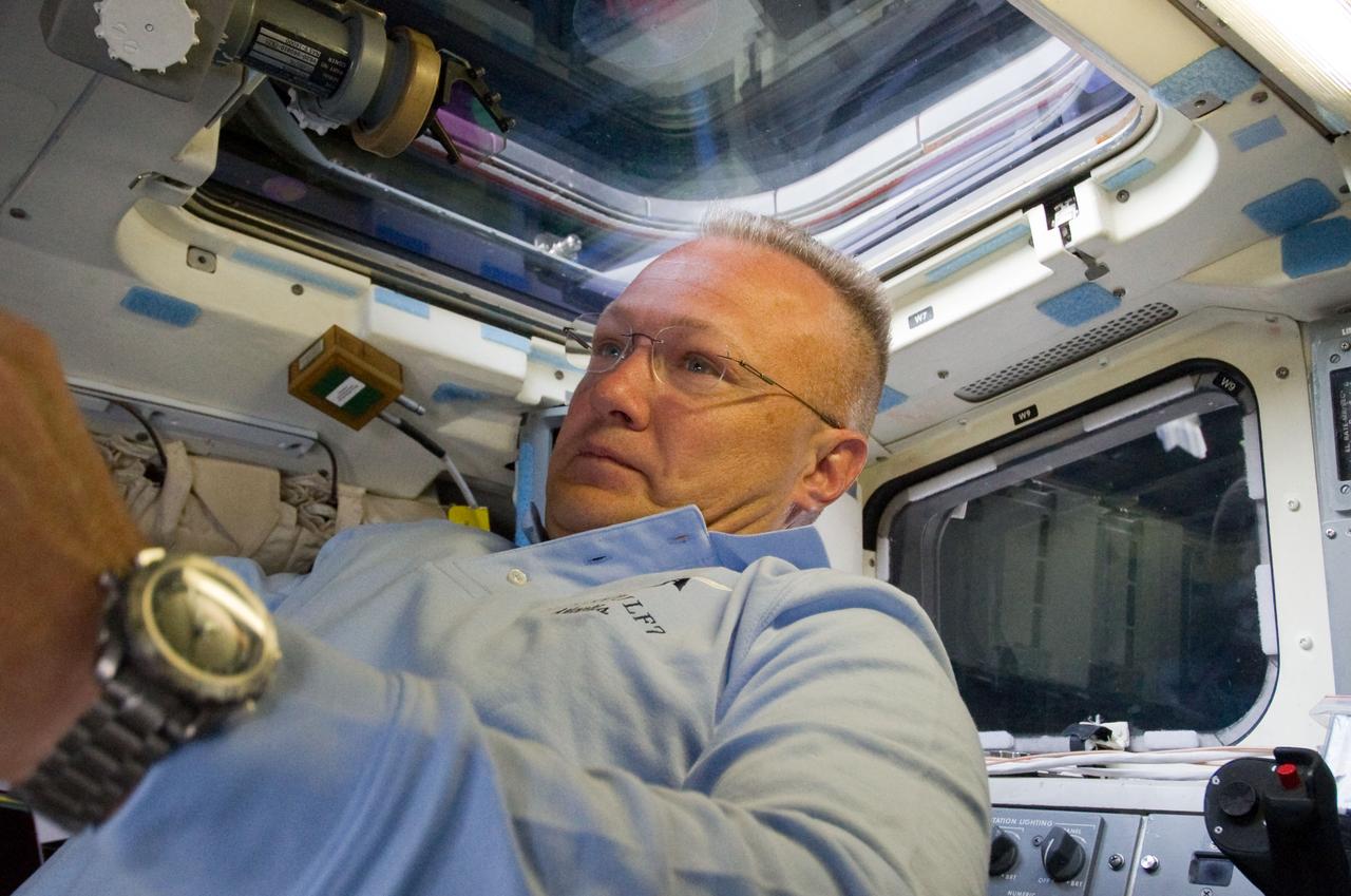 S135-E-007093 (10 July 2011) ? Astronaut Doug Hurley, STS-135 pilot, is pictured on the aft flight deck of the space shuttle Atlantis during the mission?s third day in space. Photo credit: NASA
