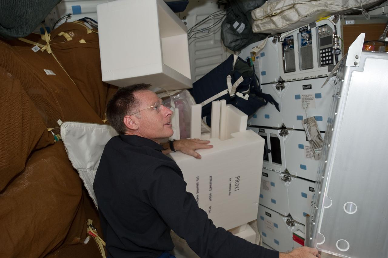 S135-E-007388 (11 July 2011) --- NASA astronaut Chris Ferguson, STS-135 mission commander, is pictured on the middeck of the space shuttle Atlantis during the mission's fourth day in space and second day docked with the International Space Station. Photo credit: NASA