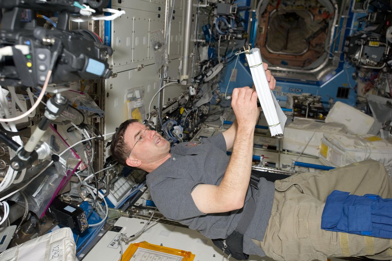 S135-E-007434 (11 July 2011) --- NASA astronaut Rex Walheim, STS-135 mission specialist, is pictured in the U.S. lab or Destiny on the International Space Station during the fourth day in space for the Atlantis crew and the second day during which the two spacecraft are docked in Earth orbit. Photo credit: NASA