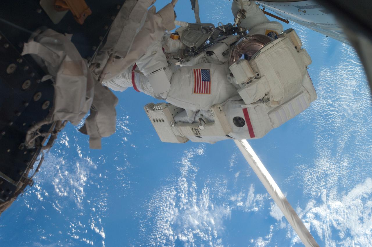 S135-E-007636 (12 July 2011) --- This is a medium close-up view of NASA astronaut Mike Fossum, Expedition 28 flight engineer, as he participates in the July 12 six and a half hour spacewalk on the International Space Station. Photo credit: NASA