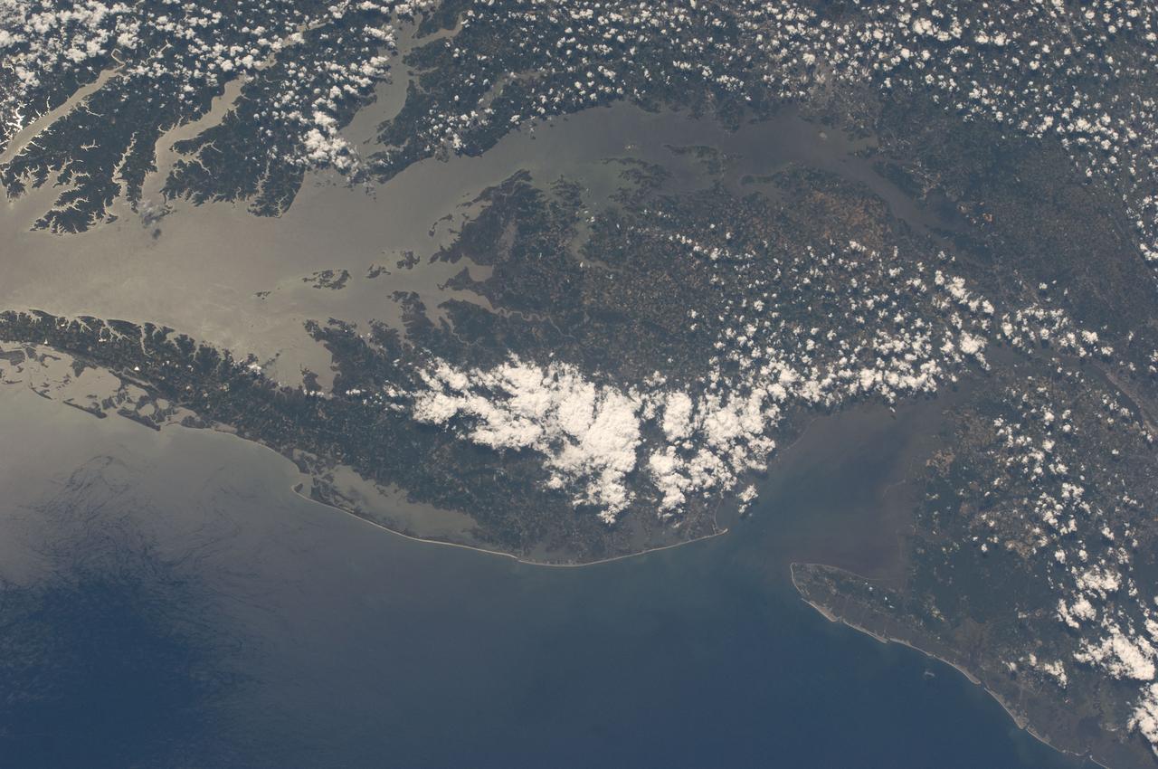 S135-E-008791 (16 July 2011) --- While flying above the Atlantic Ocean, one of the members of the joint Atlantis-International Space Station crews took this photo of the Delmarva Peninsula from the orbiting complex on July 16, 2011. Photo credit: NASA