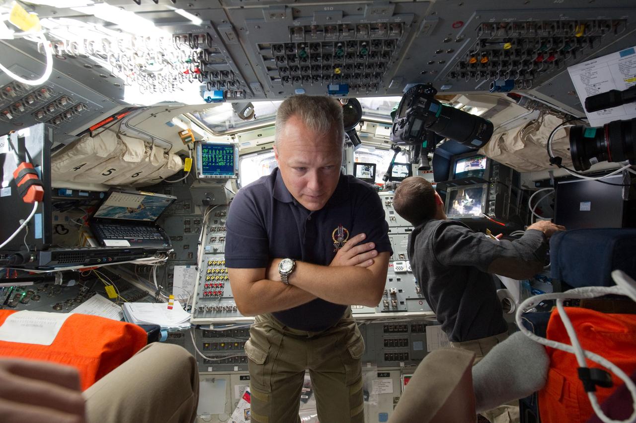 S135-E-010702 (19 July 2011) --- NASA astronauts Doug Hurley (left), pilot for the STS-135 mission and Rex Walheim, mission specialist, are pictured on the flight deck of the space shuttle Atlantis prior to undocking/separation from the International Space Station. Photo credit: NASA