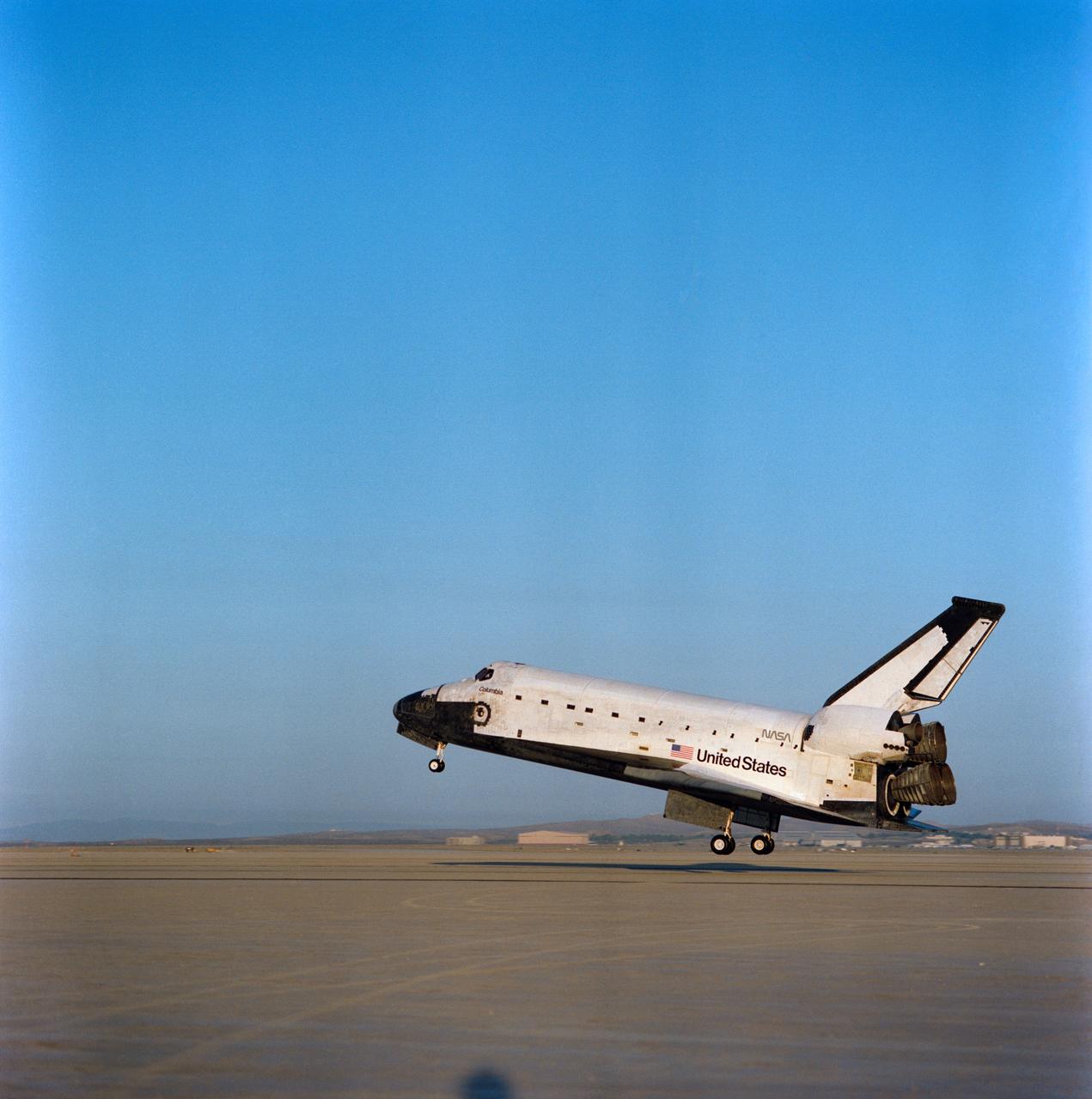 STS028-S-013 (13 Aug 1989) --- The Space Shuttle Columbia is captured on film just prior to main gear touchdown at Edwards Air Force Base in Southern California. The landing marked a successful end to a five-day DOD-devoted mission. Onboard the spacecraft were Astronauts Brewster H. Shaw Jr., Richard N. Richards, David C. Leestma, James C. Adamson and Mark N. Brown.