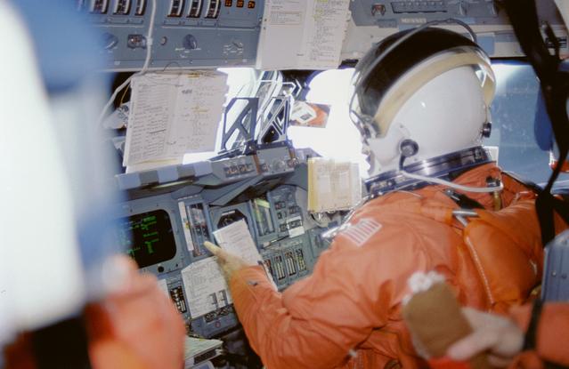 NASA image: STS-29 Discovery, OV-103, crew on flight deck during reentry