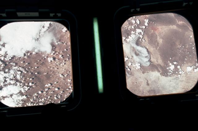 NASA image: STS-30 Earth observation is framed by aft flight deck overhead windows