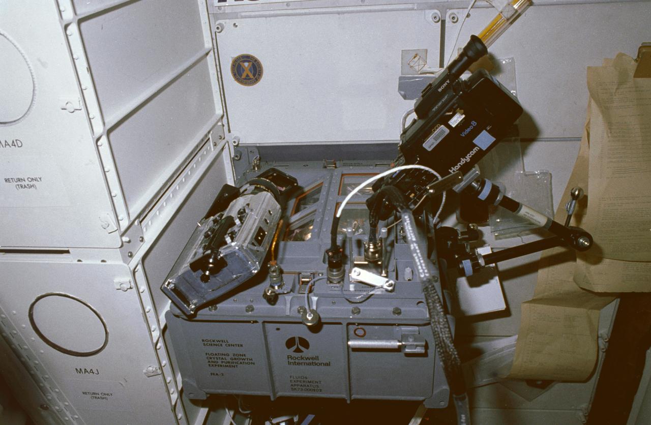 STS030-10-003 (4-8 May 1989) --- An overall scene of the onboard materials science project for STS-30.  Seen is the fluids experiment apparatus, supported by an accompanying computer and an 8mm camcorder for its operation.  Another major component of the project-- Astronaut Mary L. Cleave, who devoted a great deal of STS-30 monitoring various experiments--is out of frame.