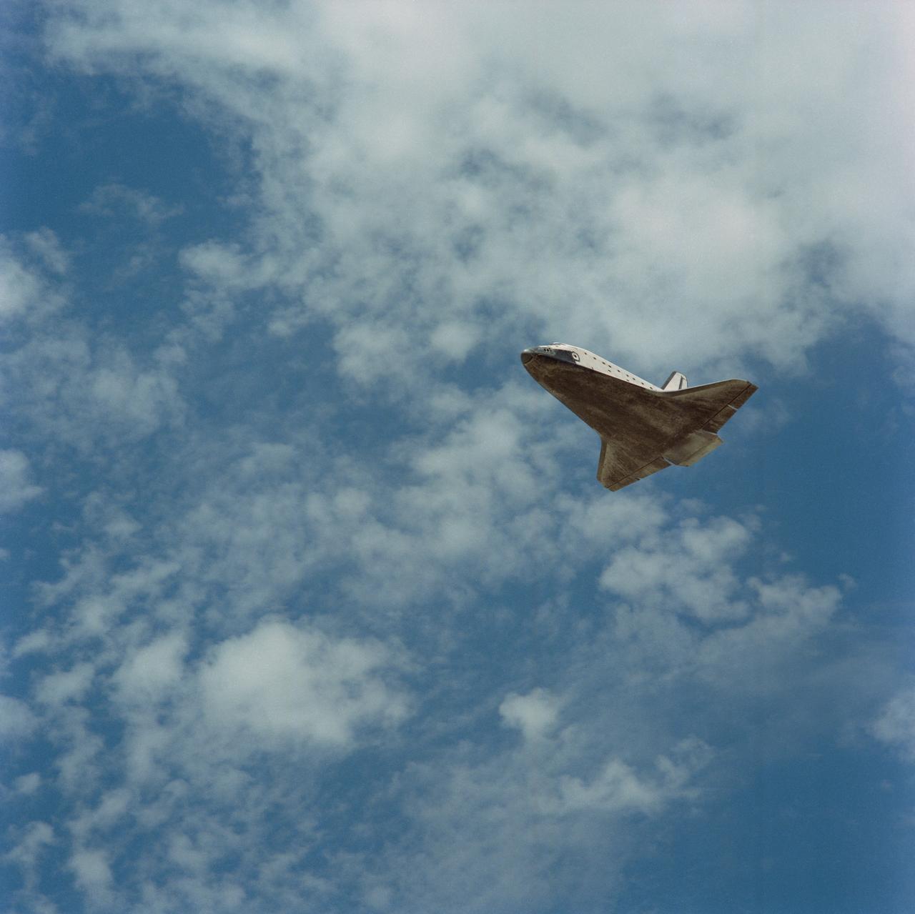 STS030-S-123 (8 May 1989) --- The Space Shuttle Atlantis glides toward a landing on the Mojave Desert after spending just over four full days in space. Aboard were astronauts David. M. Walker, Ronald J. Grabe, Norman E. Thagard, Mary L. Cleave and Mark C. Lee. Moments later, the spacecraft?s landing gear came to a stop at 12:44:33 P.M. (PDT), 8 May 1989. It landed on runway 22, a concrete facility, like a number of other NASA flights. Still others have landed on unpaved dry lakebed strips.