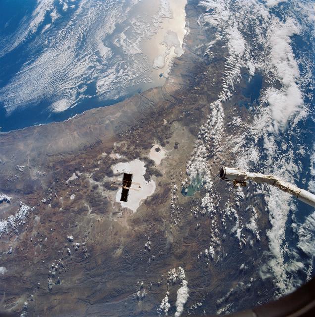 NASA image: STS-31 Hubble Space Telescope (HST) drifts away from OV-103's RMS