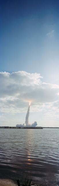 NASA image: STS-31 Discovery, OV-103, is hidden in low-lying clouds after KSC liftoff