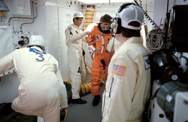 NASA image: STS-32 Commander Brandenstein dons LES equipment in KSC LC Pad 39A white room