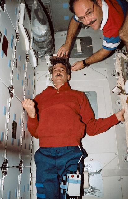 NASA image: STS-35 MS Hoffman's height is recorded by MS Lounge on OV-102's middeck