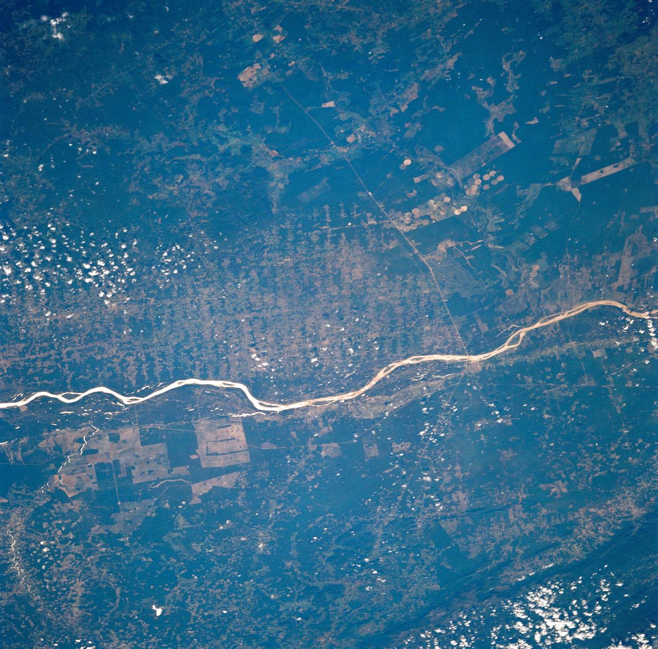 STS035-73-082 (2-10 Dec 1990) --- This agricultural and ranching area, Rio Sao Francisco, Brazil (13.0S, 43.5W) has been under study for several years. See scene STS-31-92-045 for comparison. This area has many small single family subsistence farms, large square and rectangular commercial farms and pastures for livestock grazing. Over the several years of observation, the number and size of farms has increased and center-pivot, swing-arm irrigation systems have been installed.