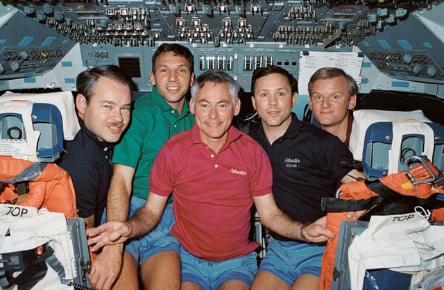 NASA image: STS-36 crewmembers pose for group portrait on OV-104's forward flight deck