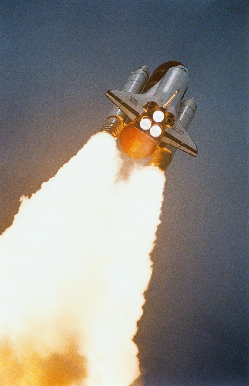 STS037-S-009 (5 April 1991) --- A 35mm low-angle view of the Space Shuttle Atlantis on its way to a busy five-day mission in Earth orbit. Launch occurred at 9:22:45:0438 (EST), April 5, 1991. Onboard were five NASA astronauts, the Gamma Ray Observatory (GRO) and other experiments.