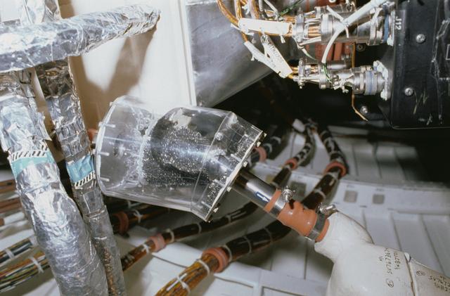 NASA image: STS-40 DTO 647 prototype filter documented under OV-102's middeck subfloor
