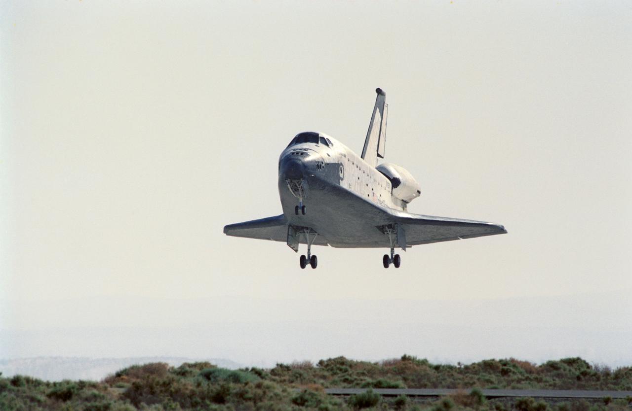 STS040-S-174 (14 June 1991) --- The Space Shuttle Columbia is only moments away from touchdown on Runway 22 at Edwards Air Force Base in California.  The landing completes a successful nine-day Spacelab Life Sciences (SLS-1) mission, the first ever devoted exclusively to life sciences research.  Onboard the spacecraft were astronauts Bryan D. O'Connor, Sidney M. Gutierrez, Rhea Seddon, James P. Bagian and Tamara E. Jernigan; and payload specialists F. Drew Gaffney and Millie Hughes-Fulford.  Landing occurred at 8:39:11 a.m. (PDT), June 14, 1991.