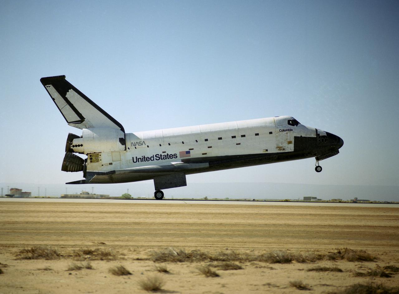 STS040-S-176 (14 June 1991) --- The main landing gear of the Space Shuttle Columbia touches down, on Runway 22 at Edwards Air Force Base in California, to complete a successful nine-day mission.  The Spacelab Life Sciences (SLS-1) mission was the first ever devoted exclusively to life sciences research.  Onboard the spacecraft were astronauts Bryan D. O'Connor, Sidney M. Gutierrez, Rhea Seddon, James P. Bagian and Tamara E. Jernigan; and payload specialists F. Drew Gaffney and Millie Hughes-Fulford.  Landing occurred at 8:39:11 a.m.  (PDT), June 14, 1991.