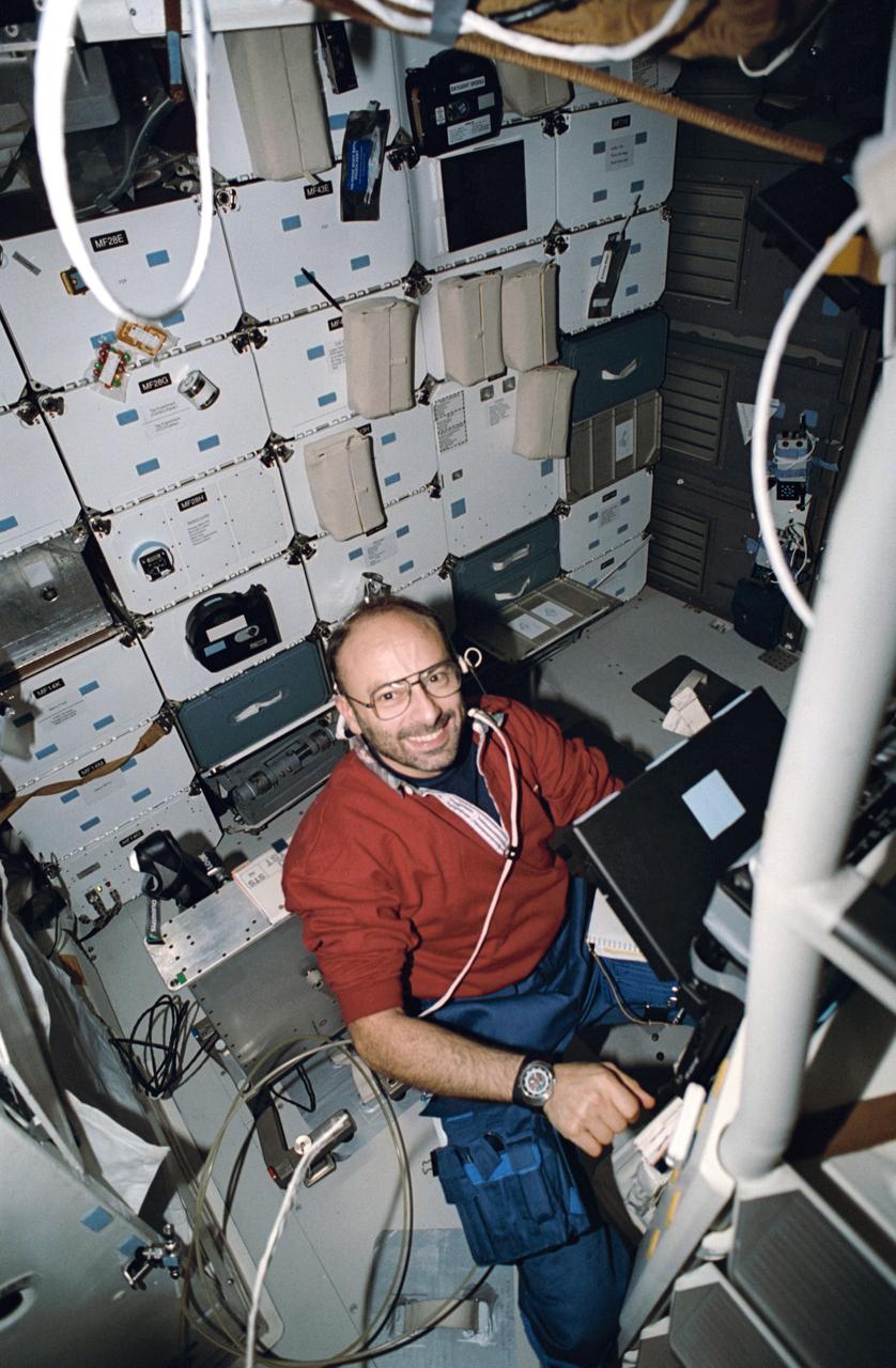 STS046-22-010 (31 July-8 Aug 1992) --- Payload specialist Franco Malerba, representing the Italian Space Agency (ASI) onboard the Space Shuttle Atlantis for the mission, works at a portable computer on the middeck.  Malerba was joined by five NASA astronauts and a Swiss scientist for the eight-day mission.