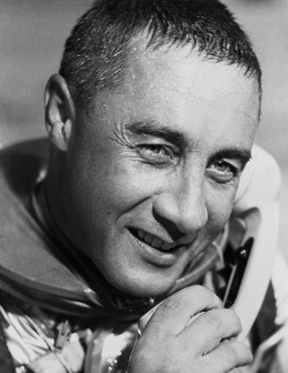 S61-02897 (21 July 1961) --- Virgil I. (Gus) Grissom, pilot of the Mercury-Redstone 4 (MR-4) ?Liberty Bell 7? spaceflight, talking on the phone with President Kennedy. Grissom is still wearing his pressure suit. Photo credit: NASA