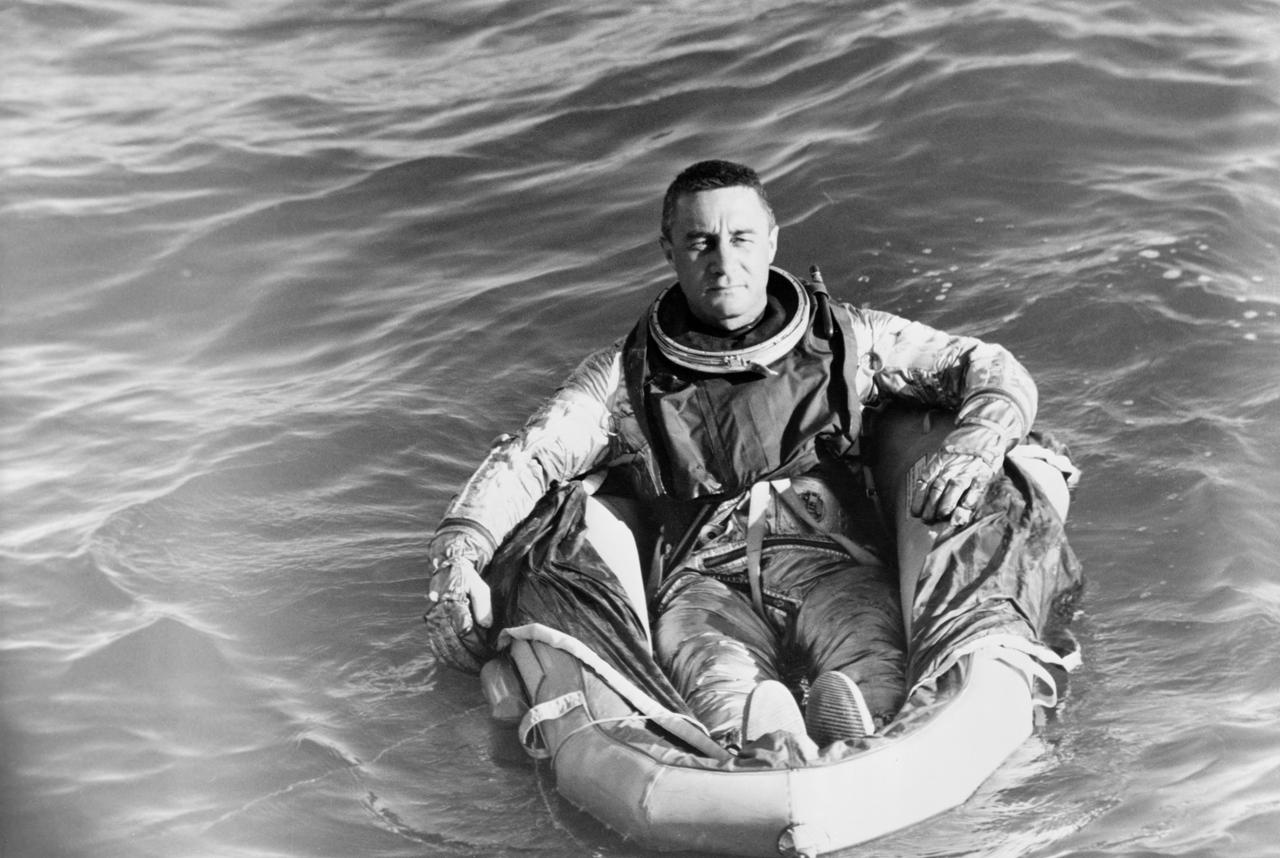 S61-04037 (1961) --- Astronaut Virgil I. (Gus) Grissom, pilot of the Mercury-Redstone 4 spaceflight, sits in a life raft during water egress training activies. Photo credit: NASA