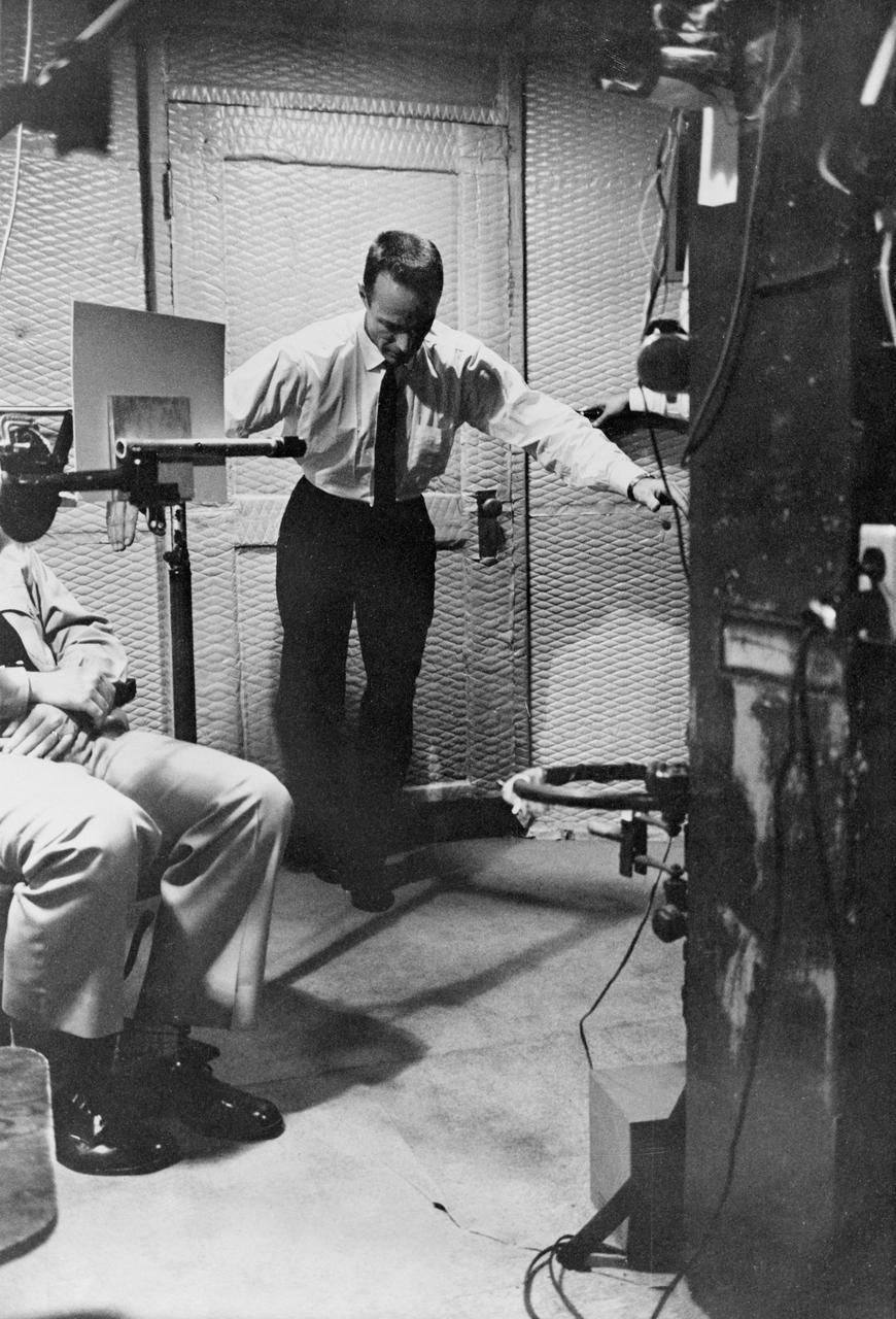 S61-04571 (1961) --- Astronaut M. Scott Carpenter's balance mechanism performance is tested as he walks a straight line by putting one foot directly in front of the other. He is performing this test at the School of Aviation Medicine, Pensicola, Florida. Photo credit: NASA
