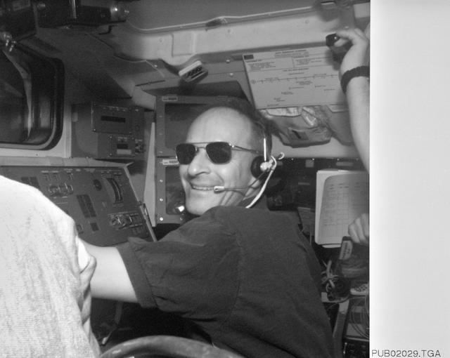 NASA image: Electronic Still Camera image of Astronaut Claude Nicollier working with RMS