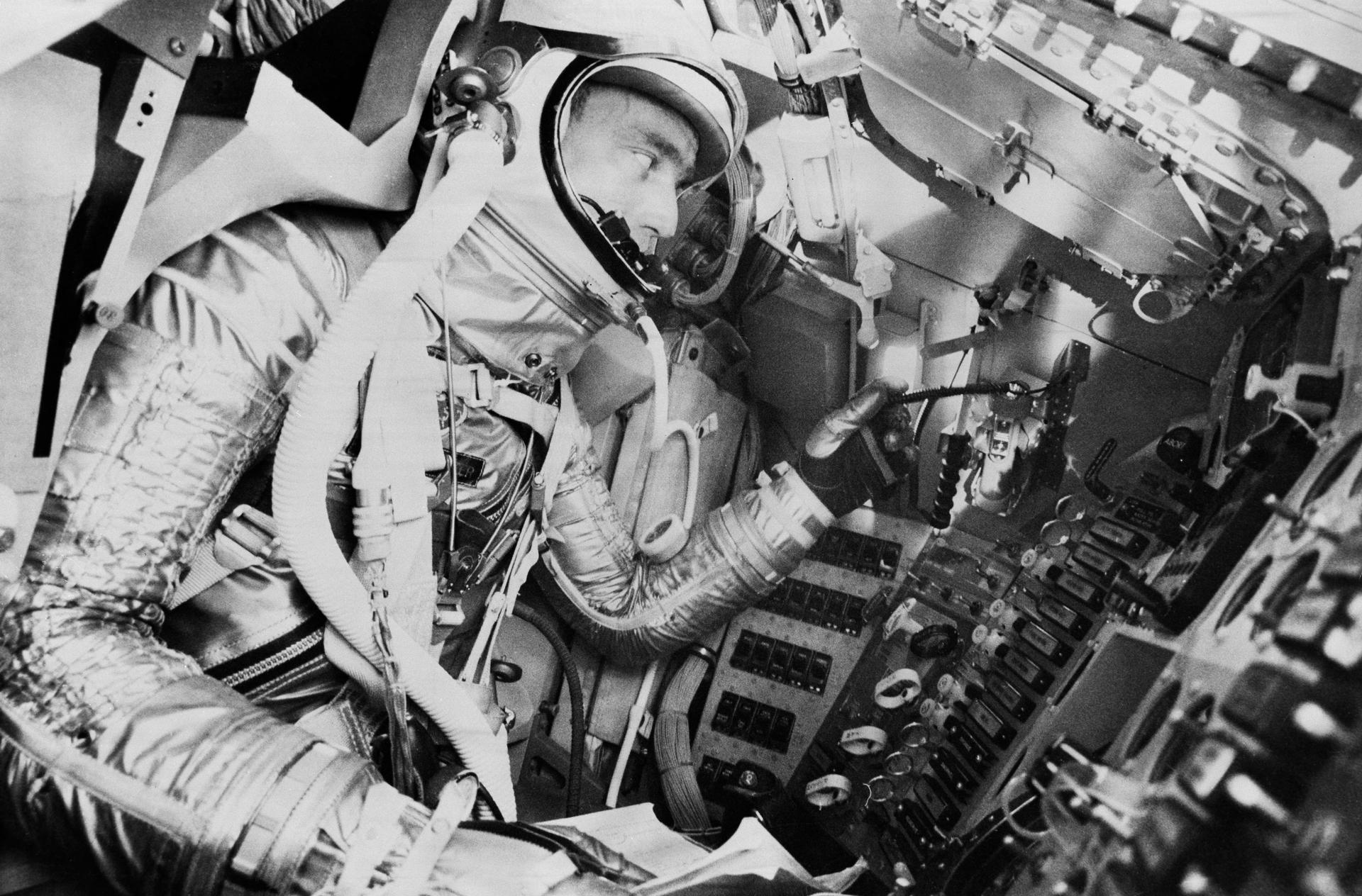 Astronaut Scott Carpenter undergoes simulated mission in procedures trainer