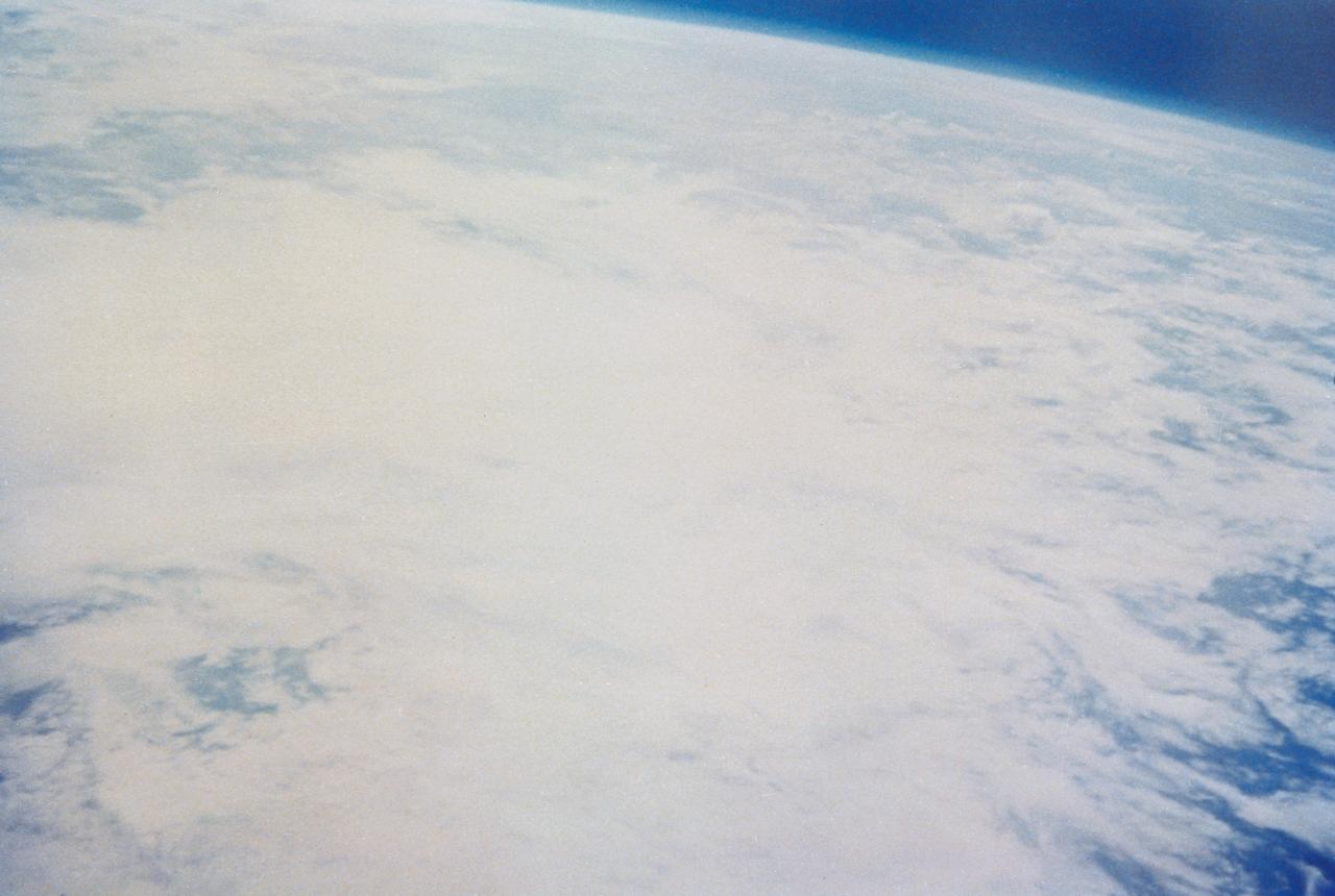S62-03250 (24 May 1962) --- Earth and sky views taken with hand-held camera by astronaut M. Scott Carpenter during Mercury-Atlas 7 (MA-7) mission. Photo credit: NASA