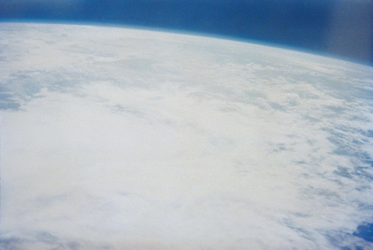 S62-03257 (24 May 1962) --- Earth and sky views taken with hand-held camera by astronaut M. Scott Carpenter during Mercury-Atlas 7 (MA-7) mission. Photo credit: NASA