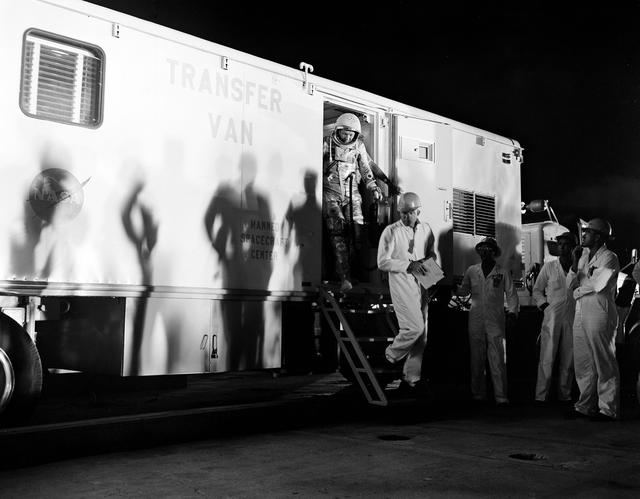 NASA image: Schirra and Cooper step from Transfer van