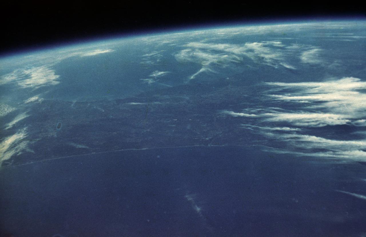 S62-06009 (20 Feb. 1962) --- View of Earth taken by astronaut John H. Glenn Jr. during his Mercury Atlas 6 (MA-6) spaceflight. Photo credit: NASA