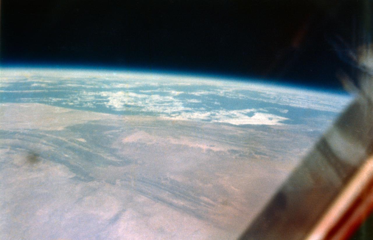 S62-06014 (20 Feb. 1962) --- View of Earth taken by astronaut John H. Glenn Jr. during his Mercury Atlas 6 (MA-6) spaceflight. Photo credit: NASA