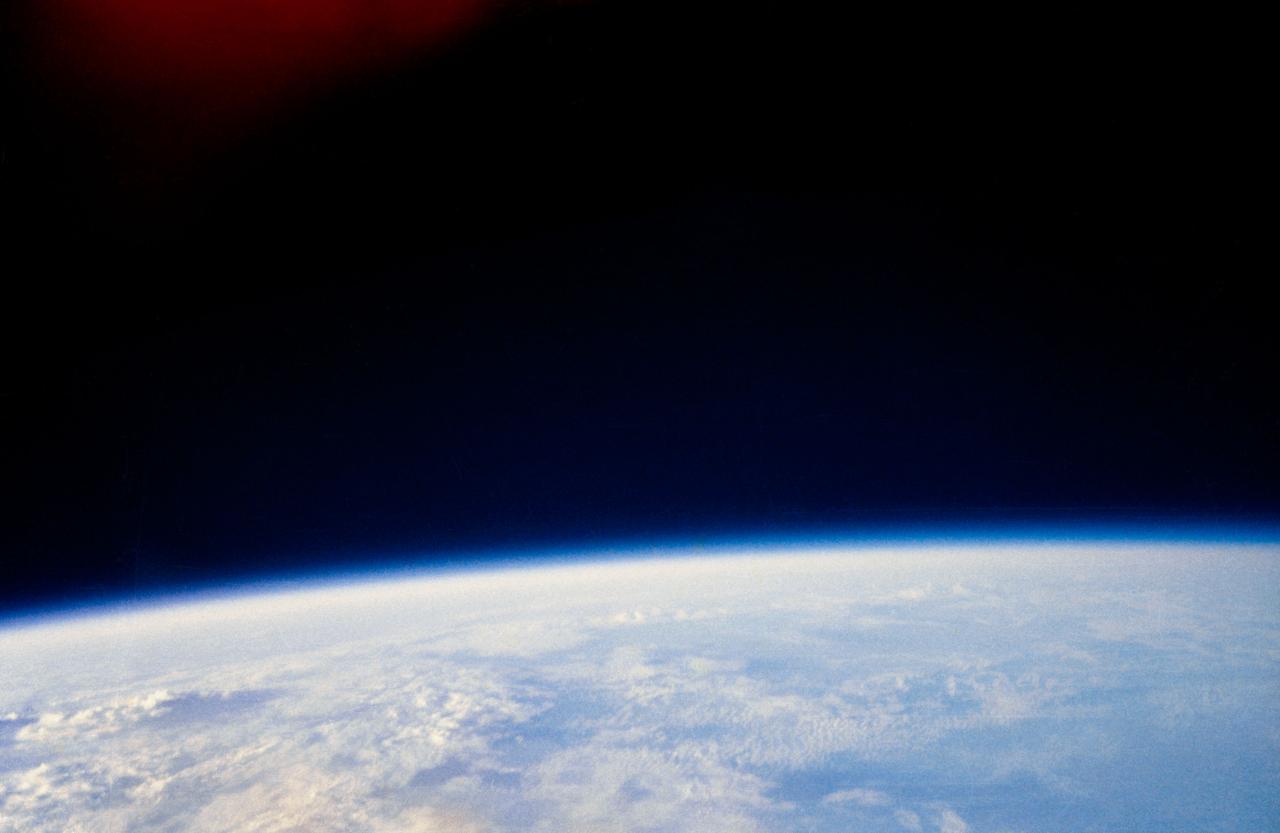 S62-06021 (20 Feb. 1962) --- A view of clouds over the Indian Ocean as photographed by astronaut John H. Glenn Jr. aboard the "Friendship 7" spacecraft during his Mercury Atlas 6 (MA-6) spaceflight on Feb. 20, 1962. The cloud panorama illustrates the visibility of different cloud types and weather patterns. Shadows produced by the rising sun aid in the determination of relative cloud heights. Photo credit: NASA