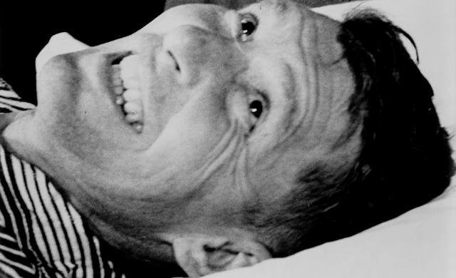 NASA image: Astronaut Walter Schirra smiles during post-flight physcial